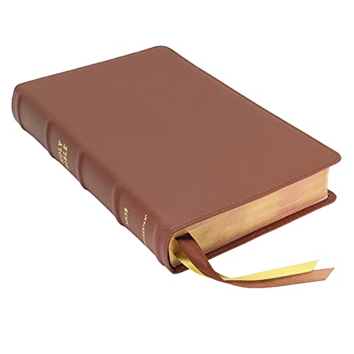 Brown leather Bible with gold-edged pages and a yellow ribbon bookmark.
