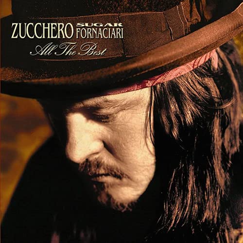 Zucchero album cover featuring the artist in a brown hat.