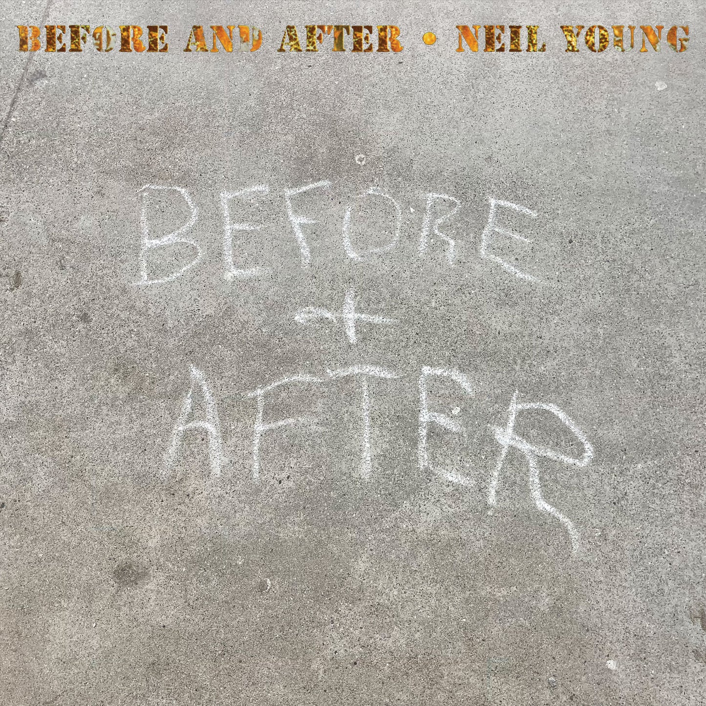 Neil Young's "Before and After" album cover with chalk writing on concrete.