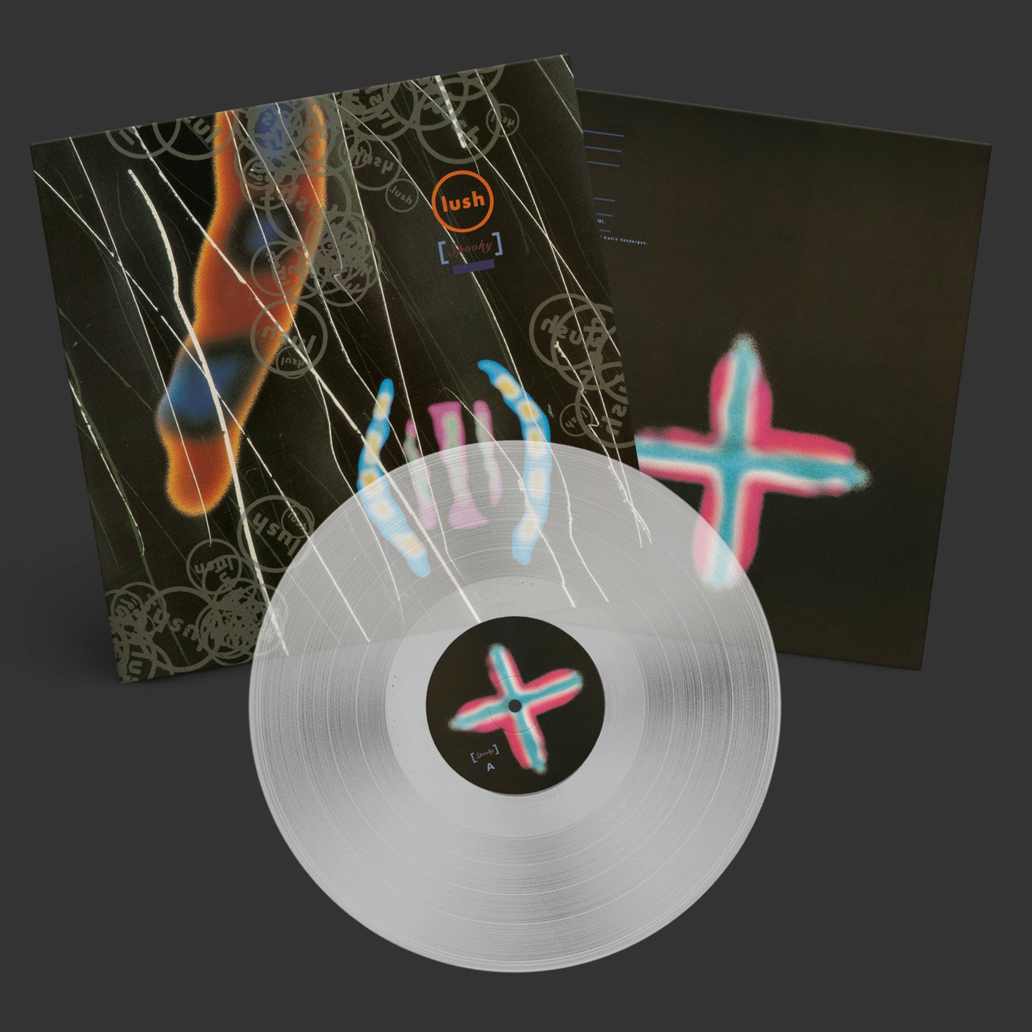Clear vinyl record in front of Lush Spooky album cover and inner sleeve.