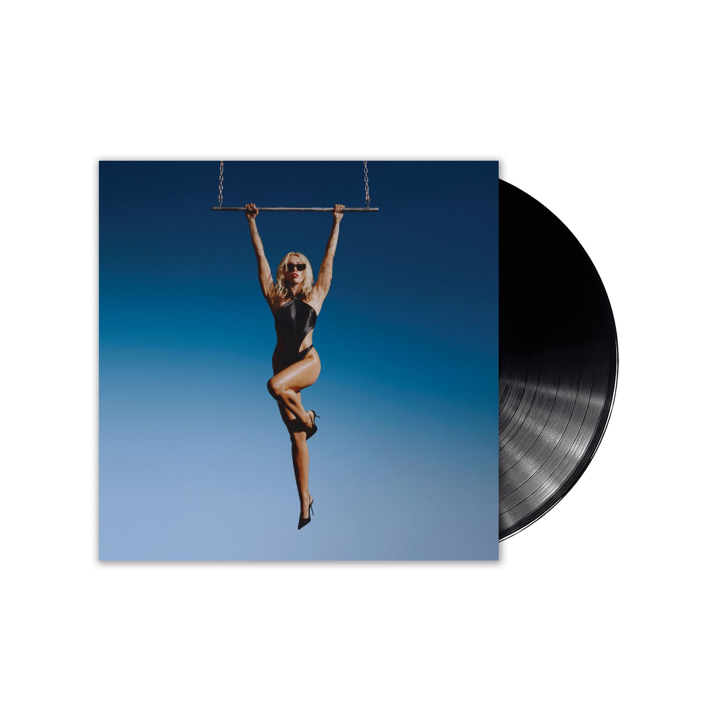 "Miley Cyrus vinyl record album cover with a woman swinging on a trapeze."