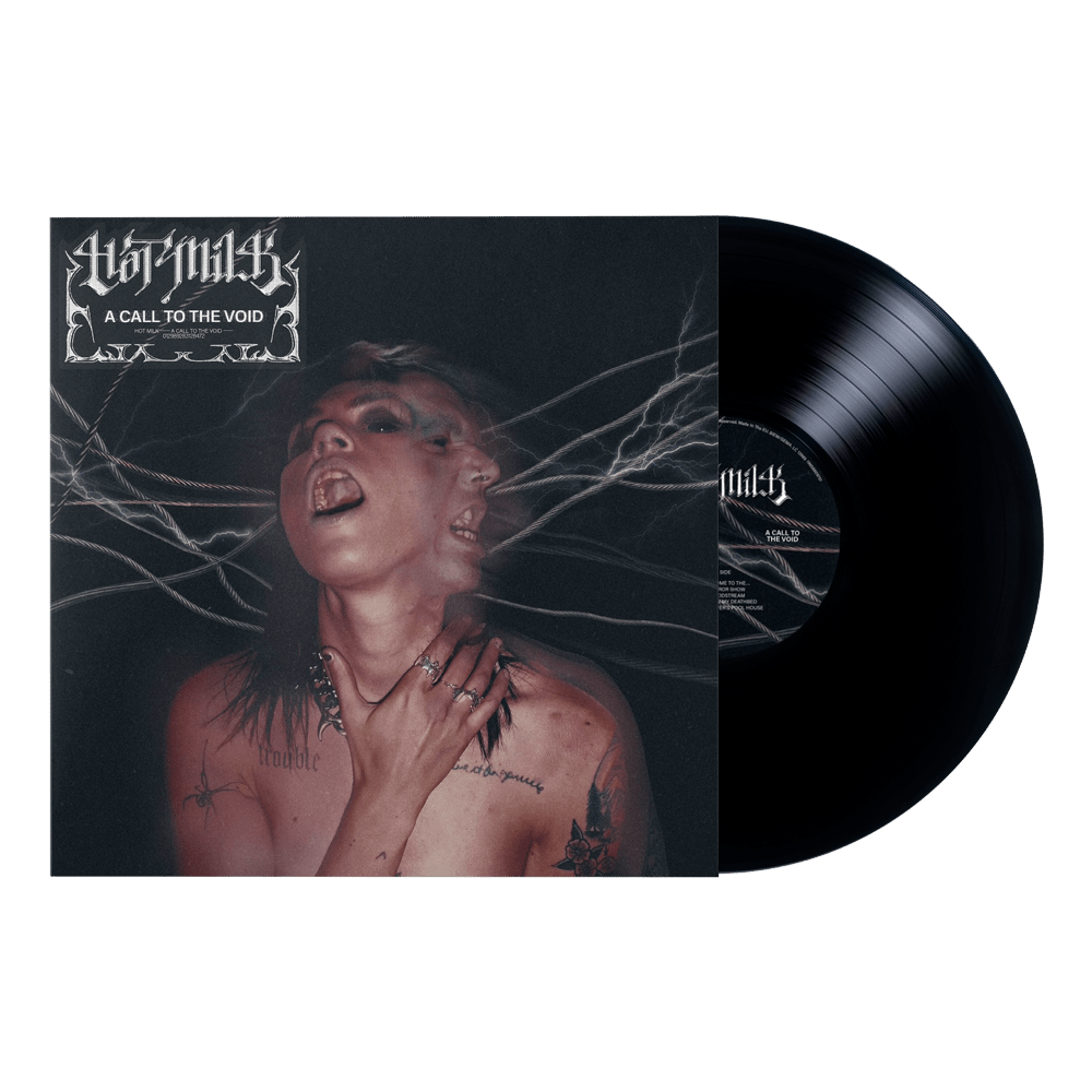 Vinyl record and cover art featuring a person with a double face and lightning.