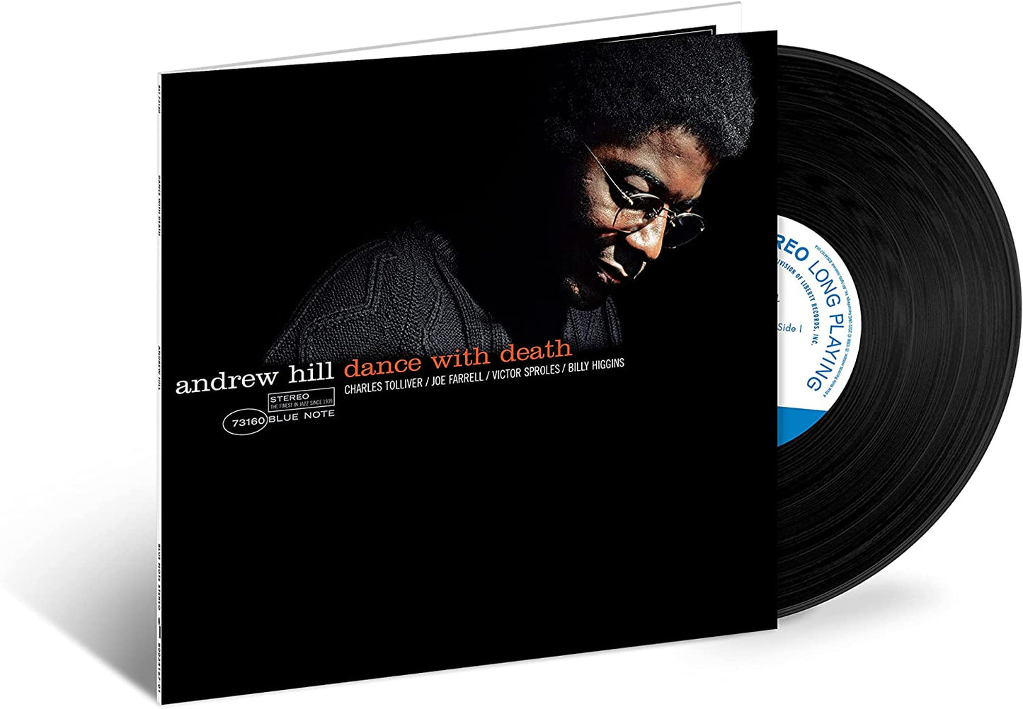 Vinyl record sleeve with a man's portrait and a black vinyl record partially visible.
