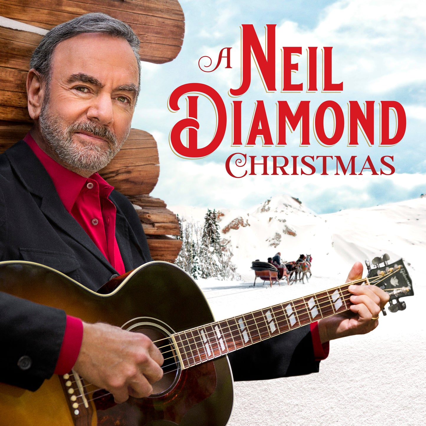 Neil Diamond holds a guitar, winter scene, album cover for "A Neil Diamond Christmas".