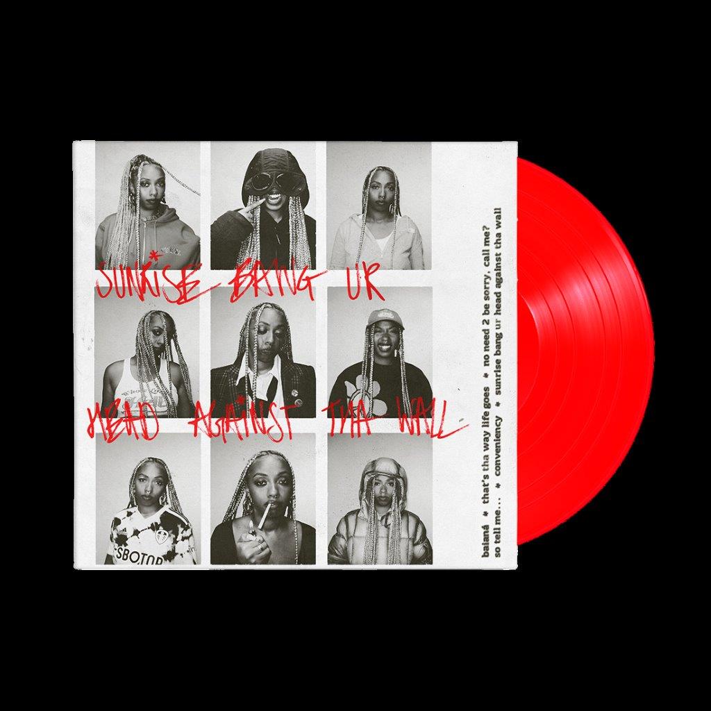 Red vinyl record with white sleeve featuring black and white photos and red text overlay.