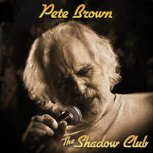 Sepia-toned portrait of Pete Brown singing into a microphone.