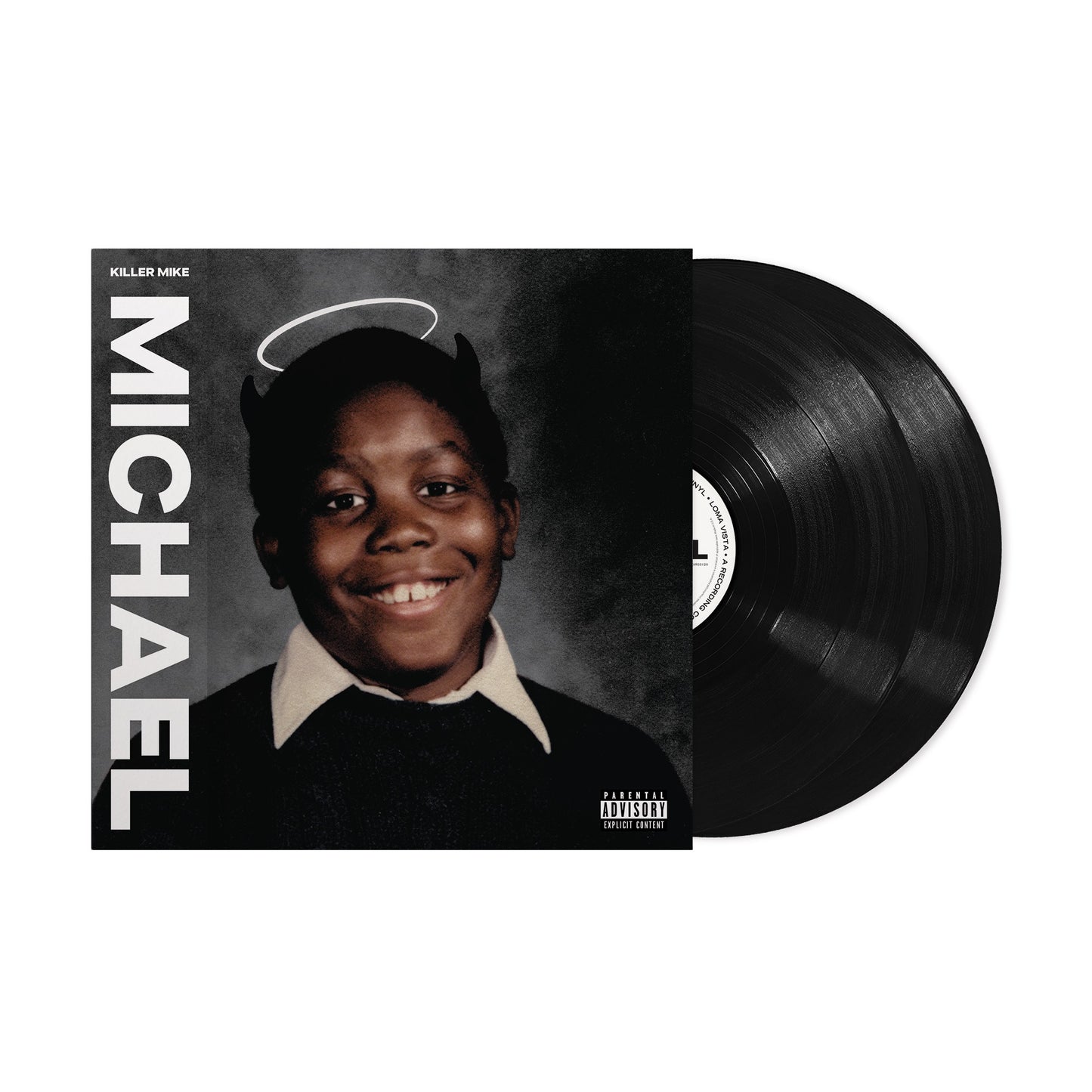 "Vinyl record with cover art featuring a young boy with halo and horns."
