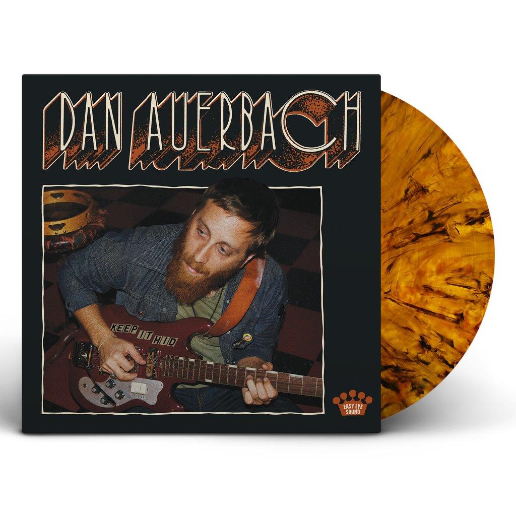 "Vinyl record with orange and black marbled disc and album cover featuring a man."