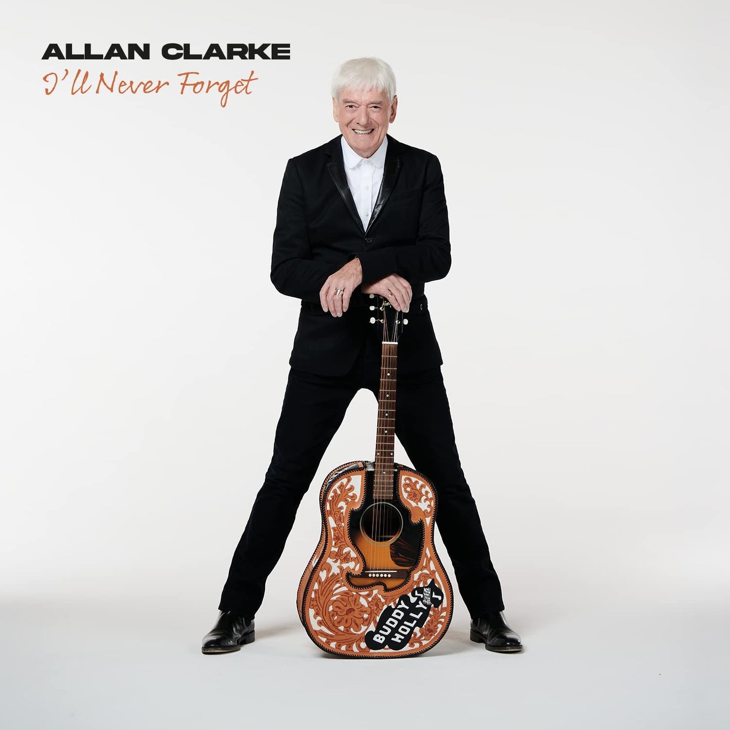 "Album cover with Allan Clarke holding a guitar, wearing a black suit."