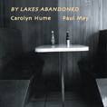 CD cover with moody image of a table setting and text.