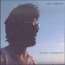 Album cover with a man's profile against a blue sky, wearing sunglasses, with artist and title.