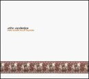 A blurry album cover with a white background and a film strip at the bottom.