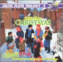"CD cover with children playing flutes in a snowy scene, titled 'Celtic Christmas'."