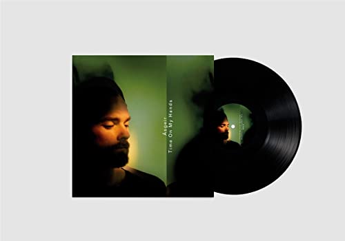 Black vinyl record with album cover featuring a portrait of Asgeir.