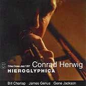 Conrad Herwig's "Hieroglyphica" CD cover featuring a close-up of a man's face.