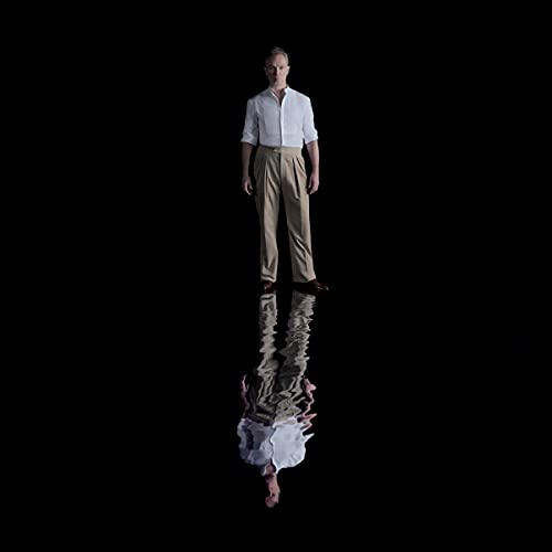 Gary Kemp album cover, man in white shirt reflected in dark water.