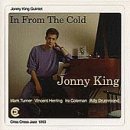CD cover: Jonny King portrait, seated at a piano, purple shirt.