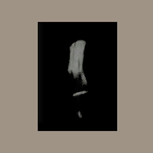 CD cover with a dark background and abstract white brushstroke design.