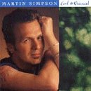 Martin Simpson's album cover featuring a man resting his head on his hand.
