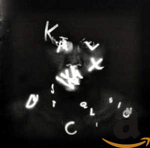 Dark album cover with floating white letters forming a face.