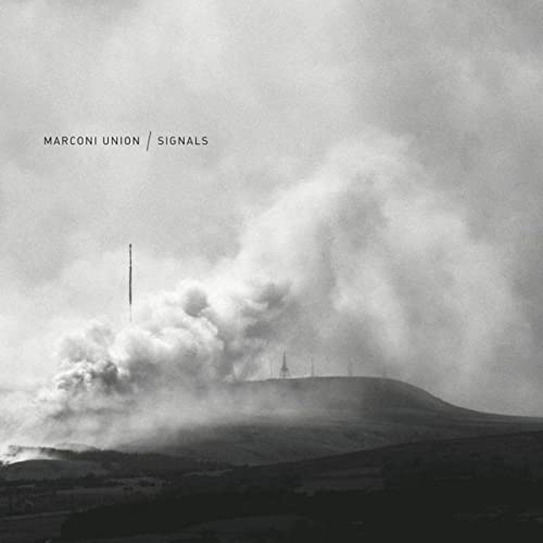 Album cover for Marconi Union’s “Signals” featuring a smoky landscape.