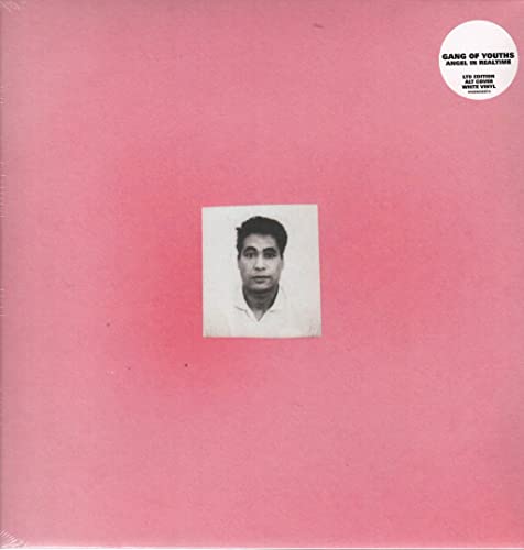 Pink vinyl record cover with a black and white portrait and sticker.
