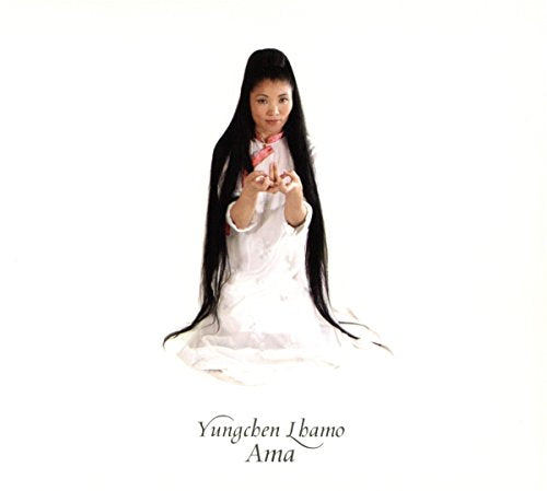 Woman with long dark hair in white clothing, album cover for “Ama”.