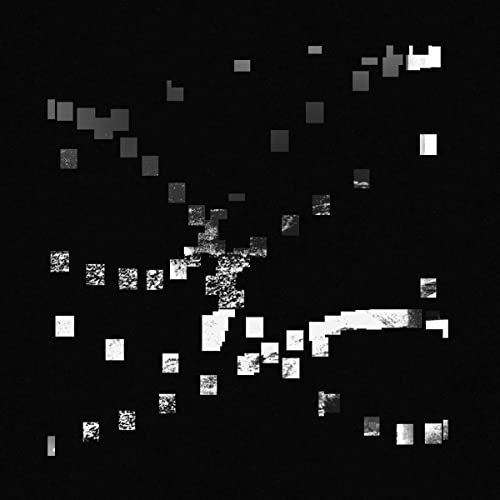 Abstract black and white squares scattered across a dark background.