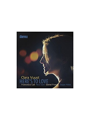 CD cover for Clara Vuust's "Here's To Love," featuring a woman's profile.