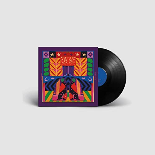 Vinyl record and colorful album cover with geometric patterns.