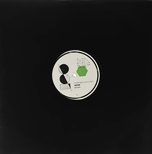 Black vinyl record with white label featuring geometric shapes and text.