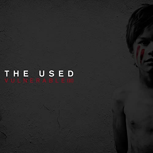 CD cover for The Used’s “Vulnerable 2”, featuring a man’s portrait.