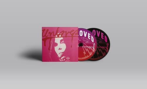 Pink album cover with a portrait and two accompanying CDs.