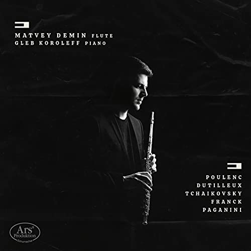 CD cover featuring a man holding a flute against a dark background.