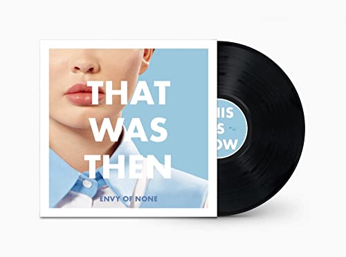 Vinyl record and album cover featuring a portrait with text.