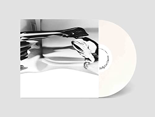 White vinyl LP by Kelly Lee Owens with abstract black and white cover art.