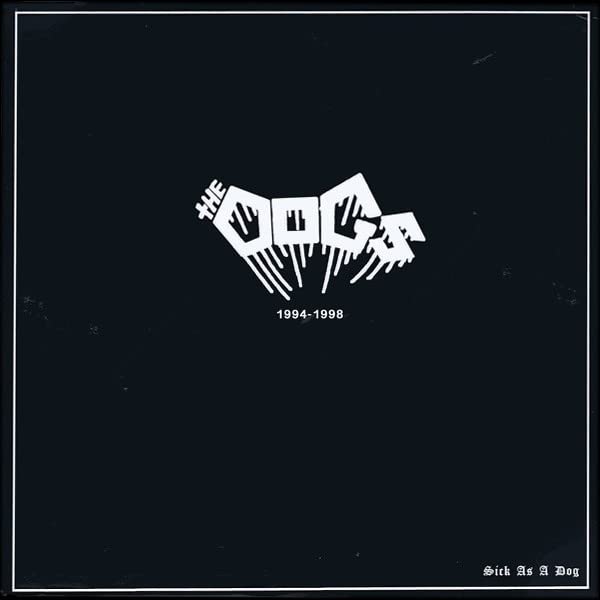 Black vinyl record cover with white dripping text: "The Dogs" and "Sick As A Dog".