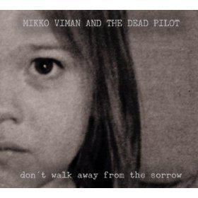 Black and white CD cover with a close-up of a child's face and text.