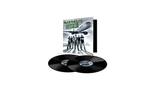 "Two black vinyl records and album cover with band members and airplane illustration."