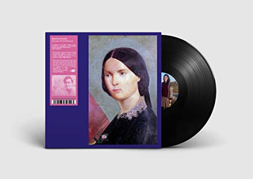 Vinyl record with cover art featuring a portrait of a woman.