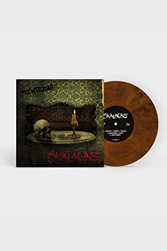 Vinyl record with orange and black marbling, featuring a skull and candle image.