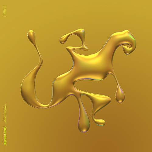 Golden, abstract fluid shape resembling an animal on a yellow background.