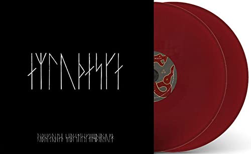 Red vinyl record with runic inscription on black album cover.