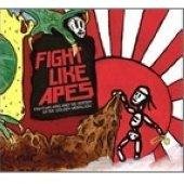 "Album cover with cartoon ape and ninja, red and white sunburst background."