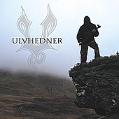 CD album cover featuring a person standing on a cliff with a hooded figure.