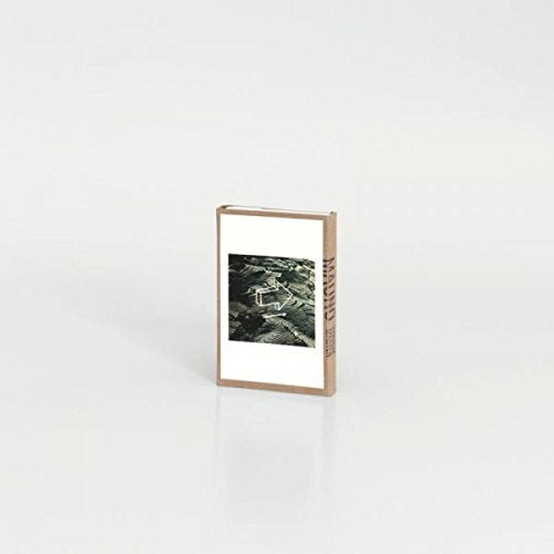 A vinyl record sleeve with a black and white landscape image on a white background.