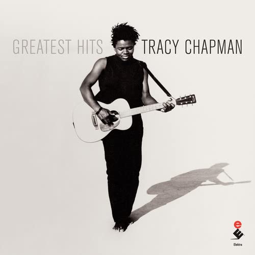 Tracy Chapman album cover: black and white portrait with guitar.