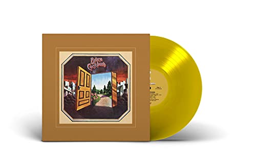 Bruce Cockburn album cover and golden vinyl record shown at angle.