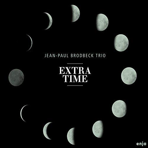 CD cover: black background with phases of the moon and text.
