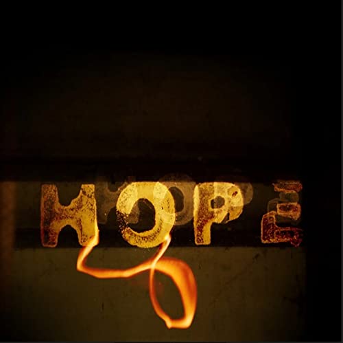 Burning letters spelling "HOPE" against a dark, textured background.